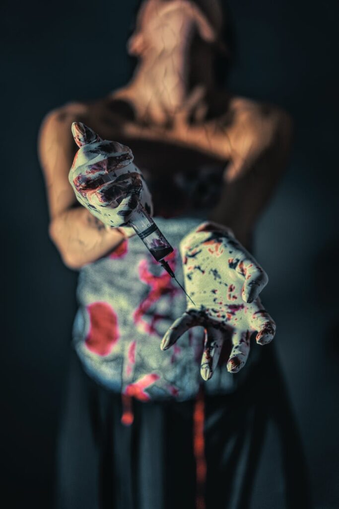 close up photo of person with paint on her hands